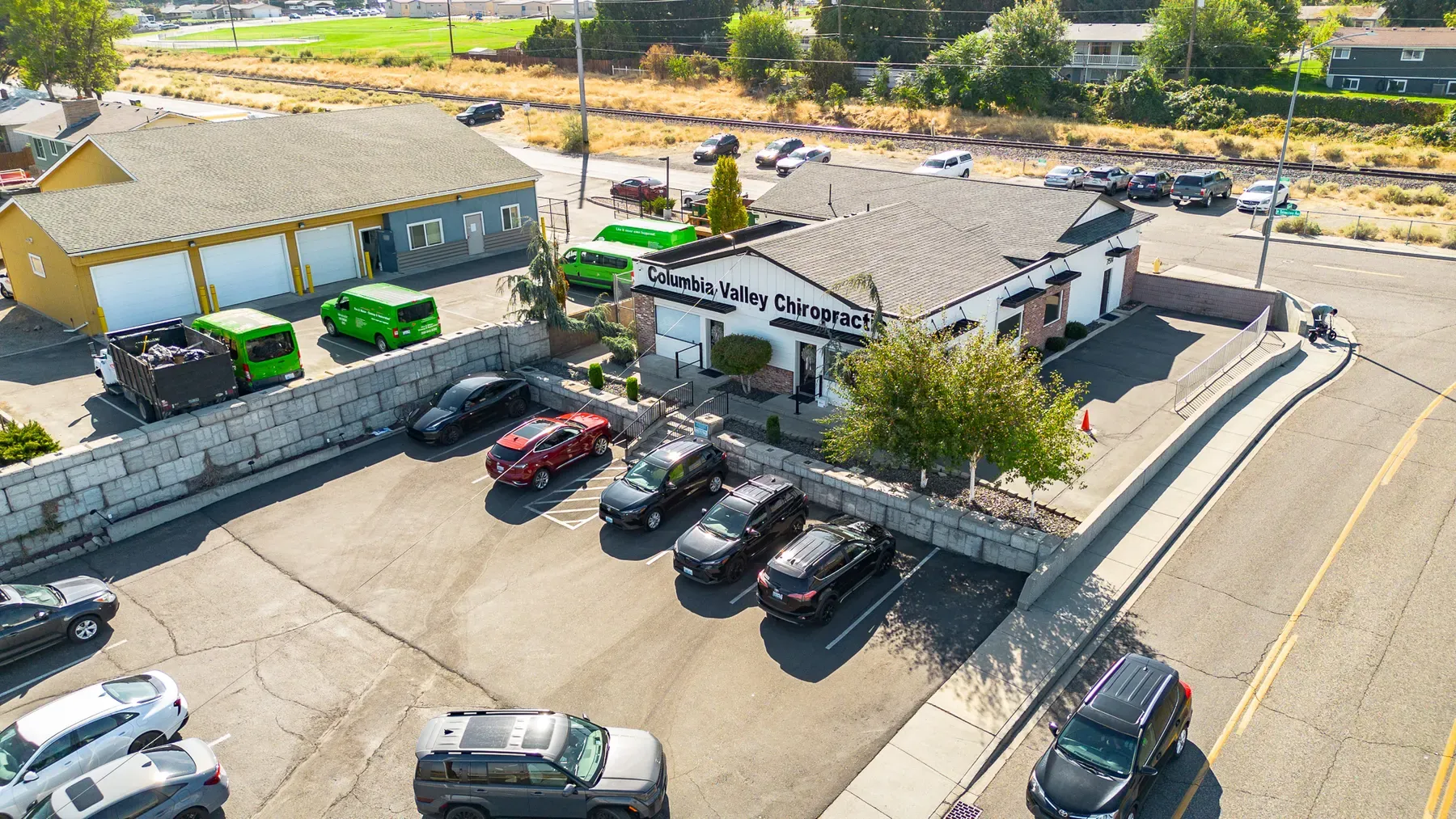 Aerial view of Columbia Valley Chiropractic Center at 7514 W Yellowstone Ave in Kennewick, with a full parking lot