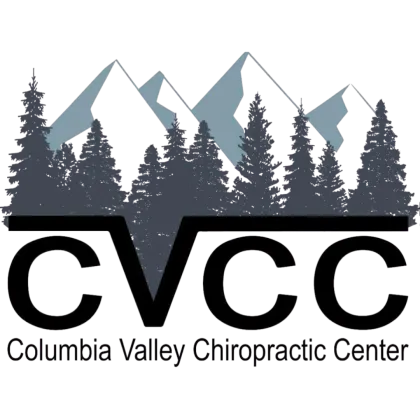 Columbia Valley Chiropractic Center logo, mountain range and pines over CVCC